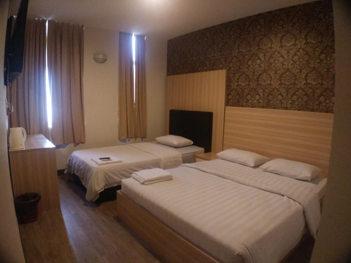 Hotel Truly Asia Кота-Кинабалу Экстерьер фото