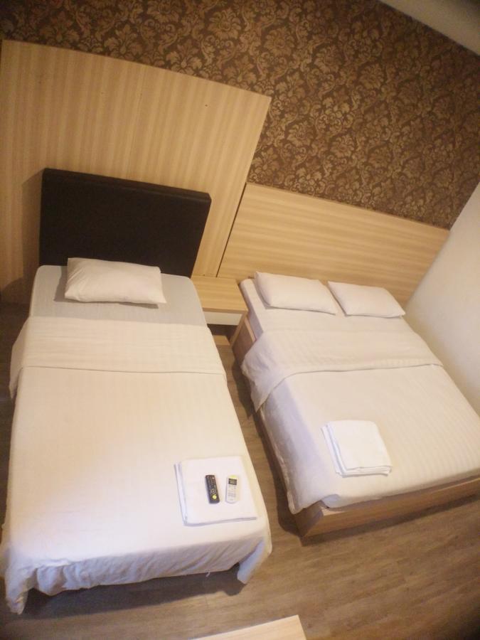 Hotel Truly Asia Кота-Кинабалу Экстерьер фото