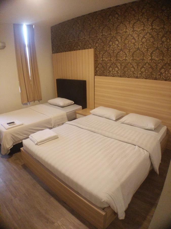 Hotel Truly Asia Кота-Кинабалу Экстерьер фото