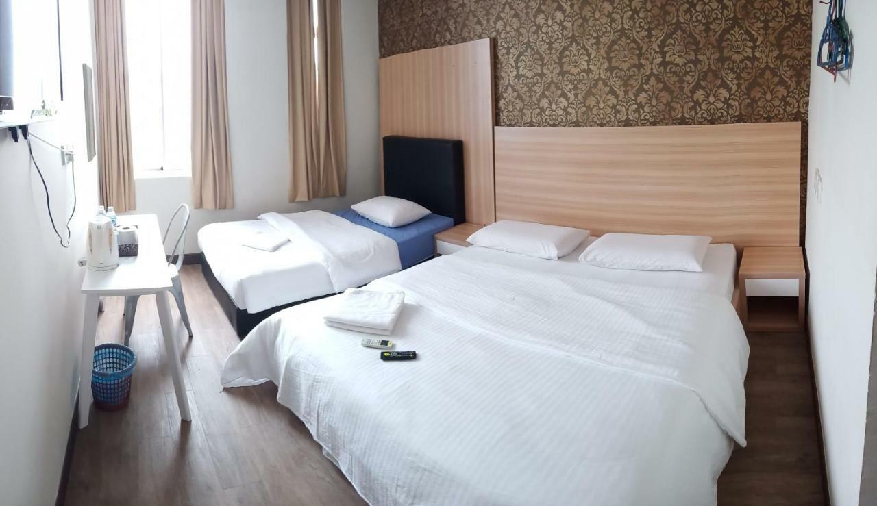 Hotel Truly Asia Кота-Кинабалу Номер фото